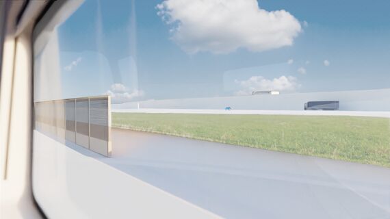 Zugfenster zeigt auf die Autobahn